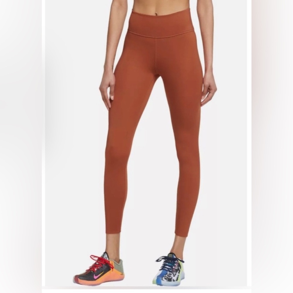 Nike one luxe burnt orange leggings. Size Large